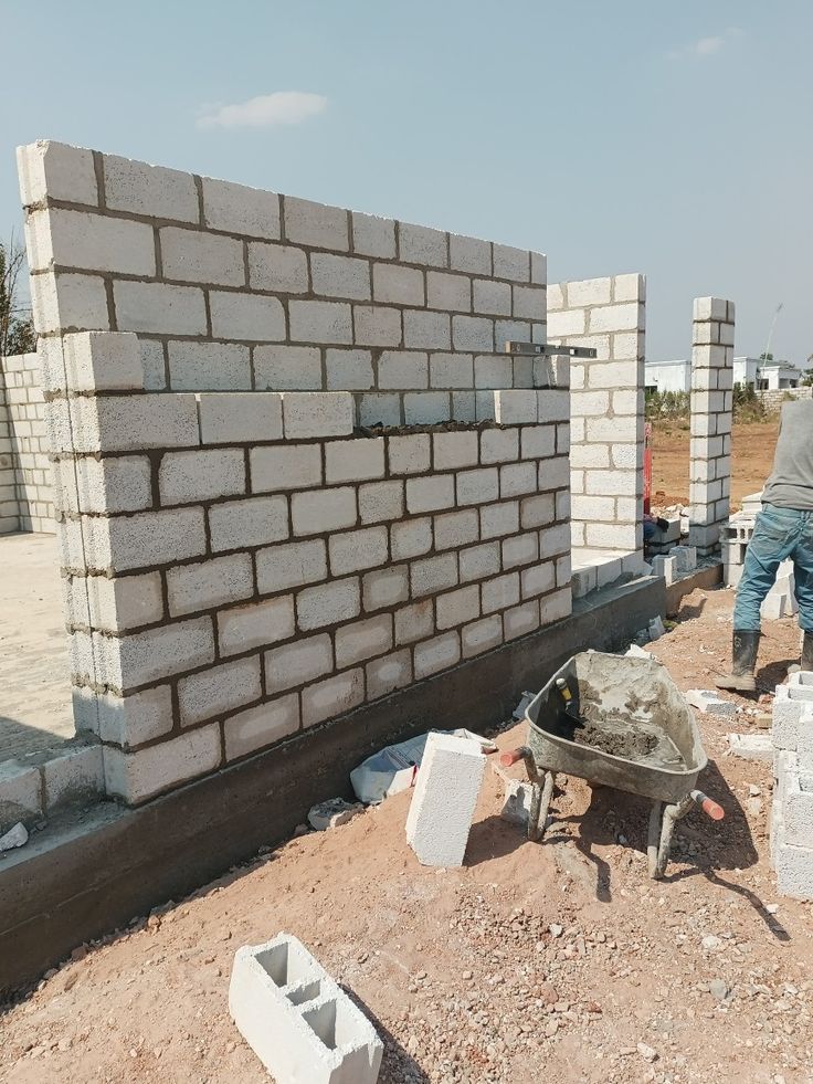 Brick masonry wall and chimney construction