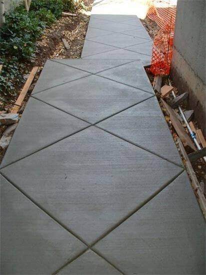 Finished concrete flatwork driveway